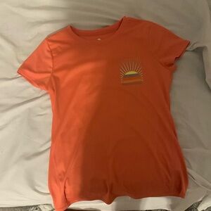 Im selling a salmon colored shirt